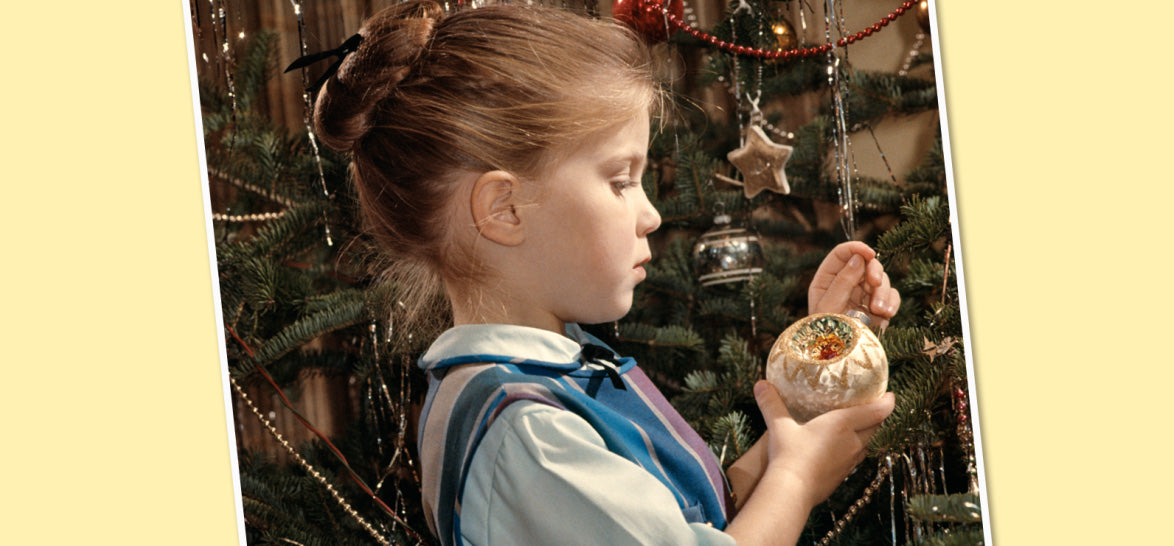 Girl with Christmas tree