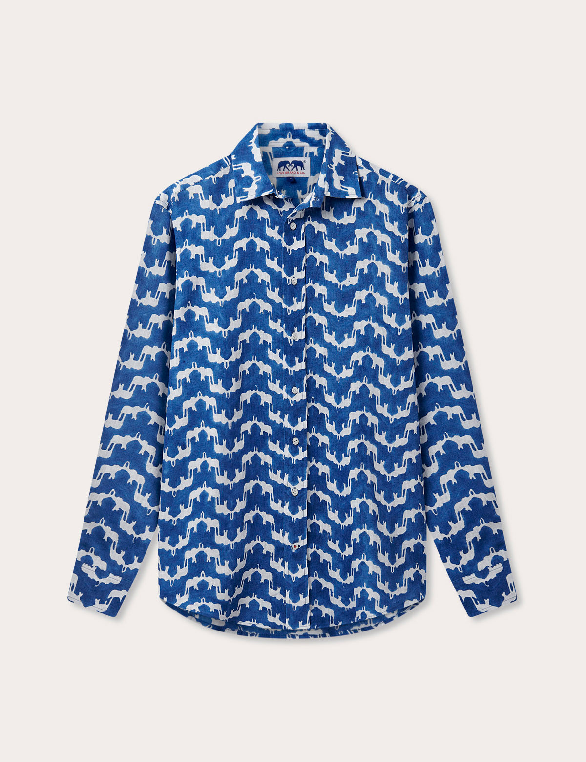 Unisex Linen Long Sleeve Shirt - Elephant Palace Blue, featuring a traditional block print of Asian elephants forming the illusion of Indian palaces, crafted from 100% premium Belgian linen.