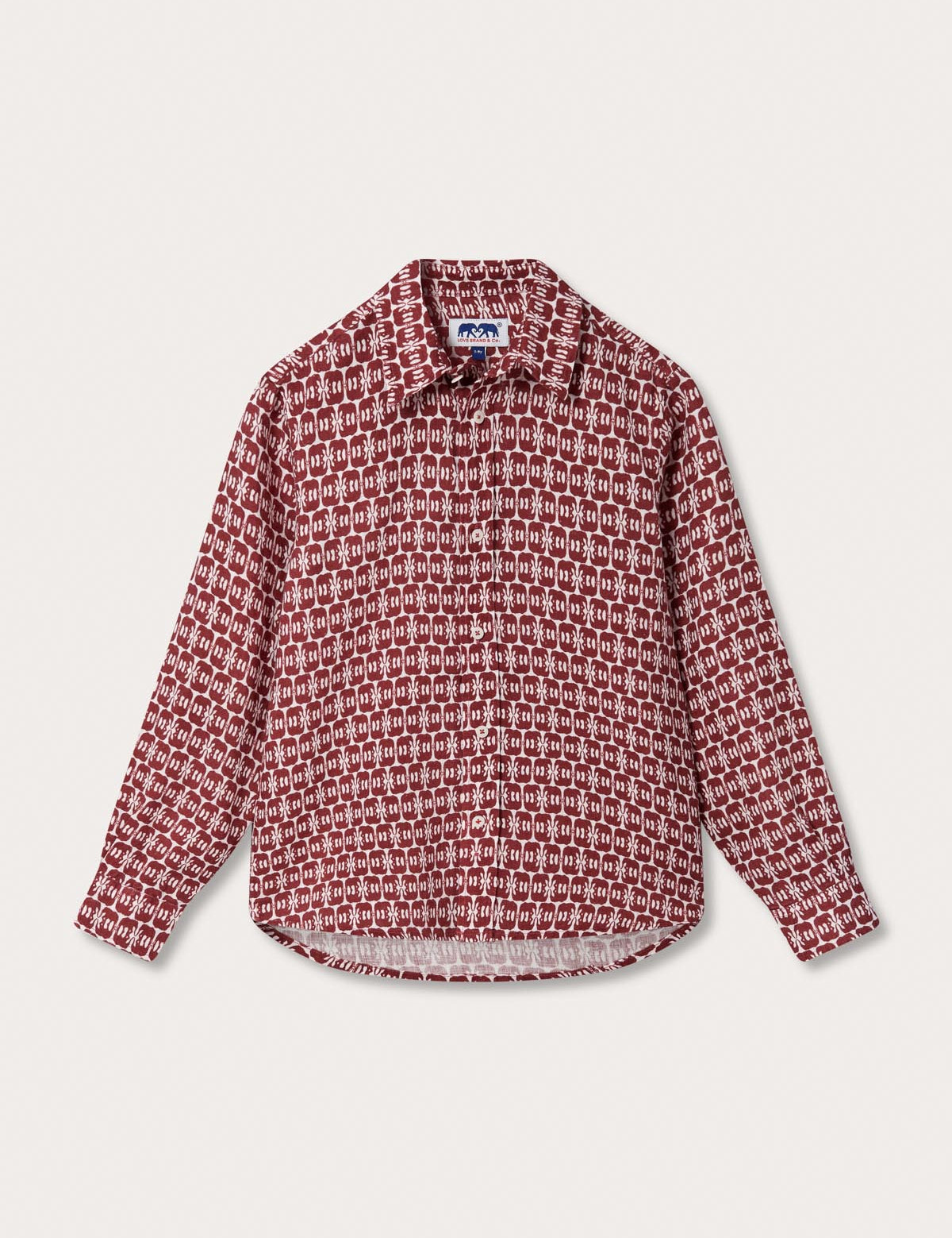 Boys Elephants of India Abaco Linen Shirt with long sleeves, featuring a dark burgundy elephant pattern on a crisp white background.