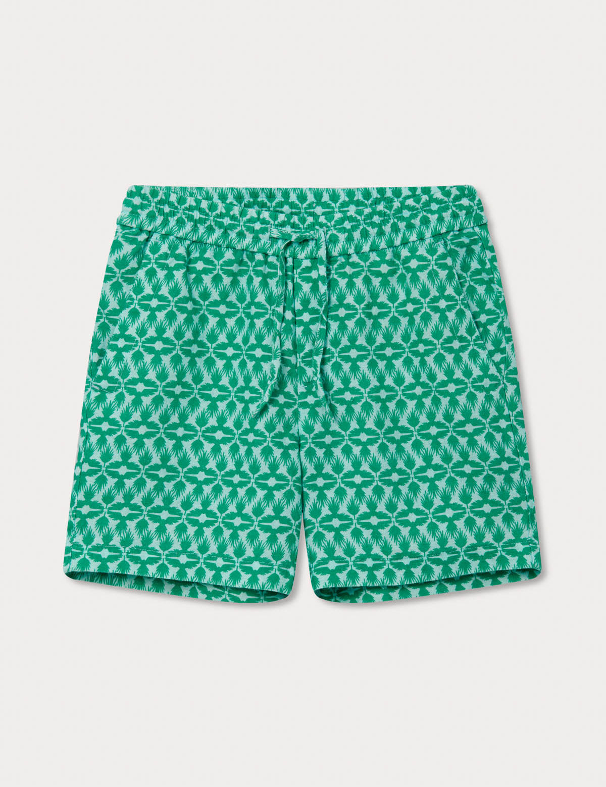 Boys Palm Eagle Joulter Shorts in green with a patterned design featuring tropical palms and the Lesser Fish Eagle of India.