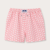 Pink swim shorts for boys with diamond geometric print of grand manta rays in watermelon and light pink; branded with Love Brand & Co.