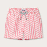 Boys' pink and white geometric print swim shorts with a bow design.