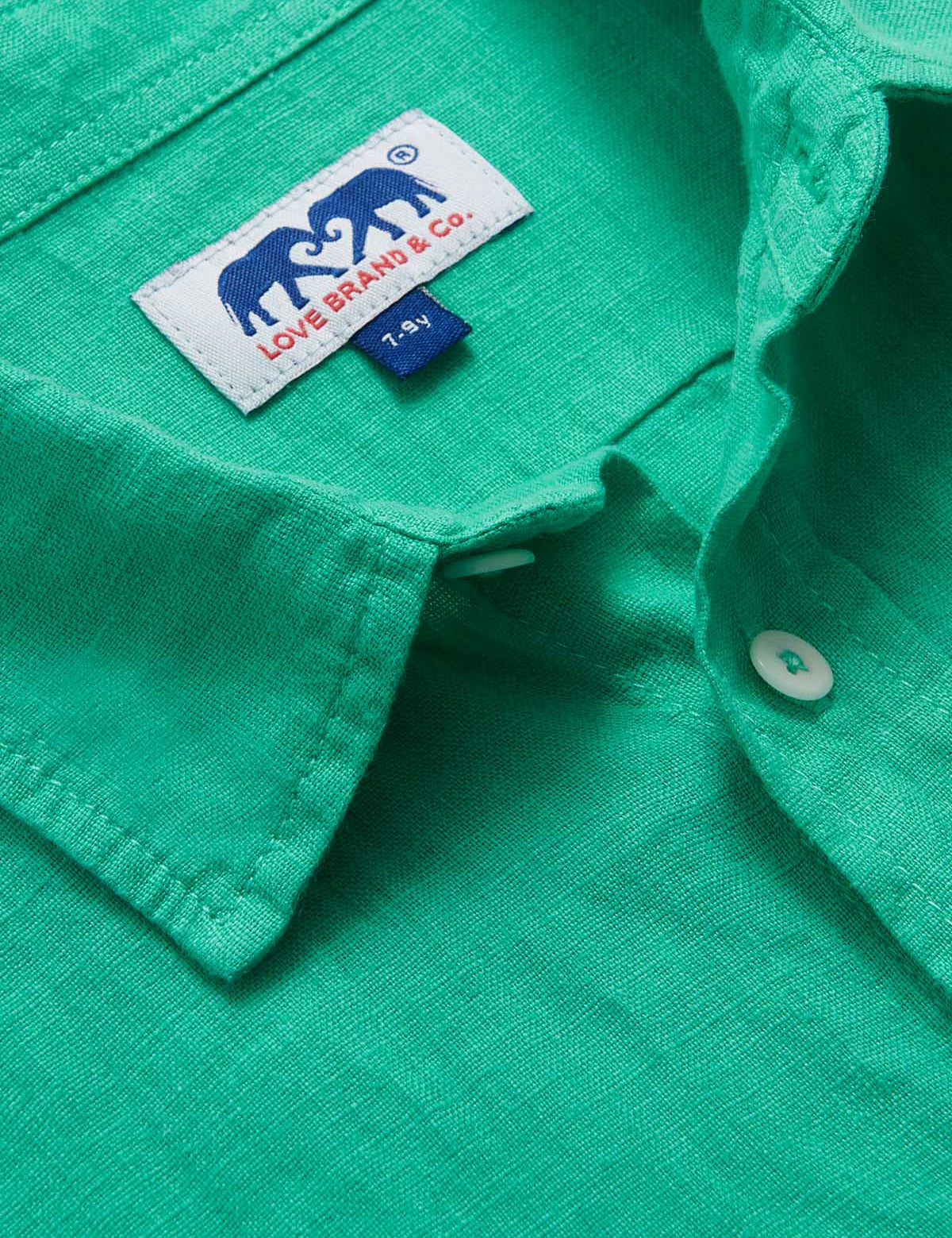 Boys Sicilian Green Abaco Linen Shirt with Love Brand & Co. logo.