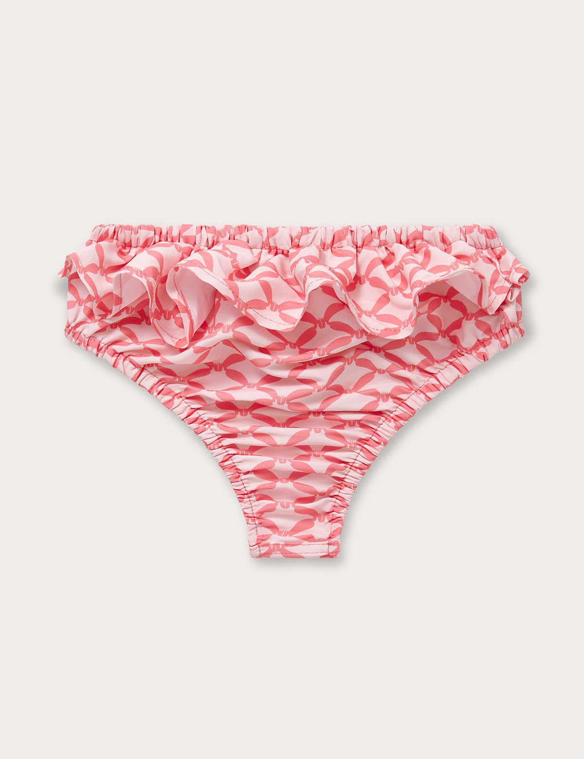 Light pink and watermelon geometric diamond print baby swim bottoms featuring a ruffled waistband.