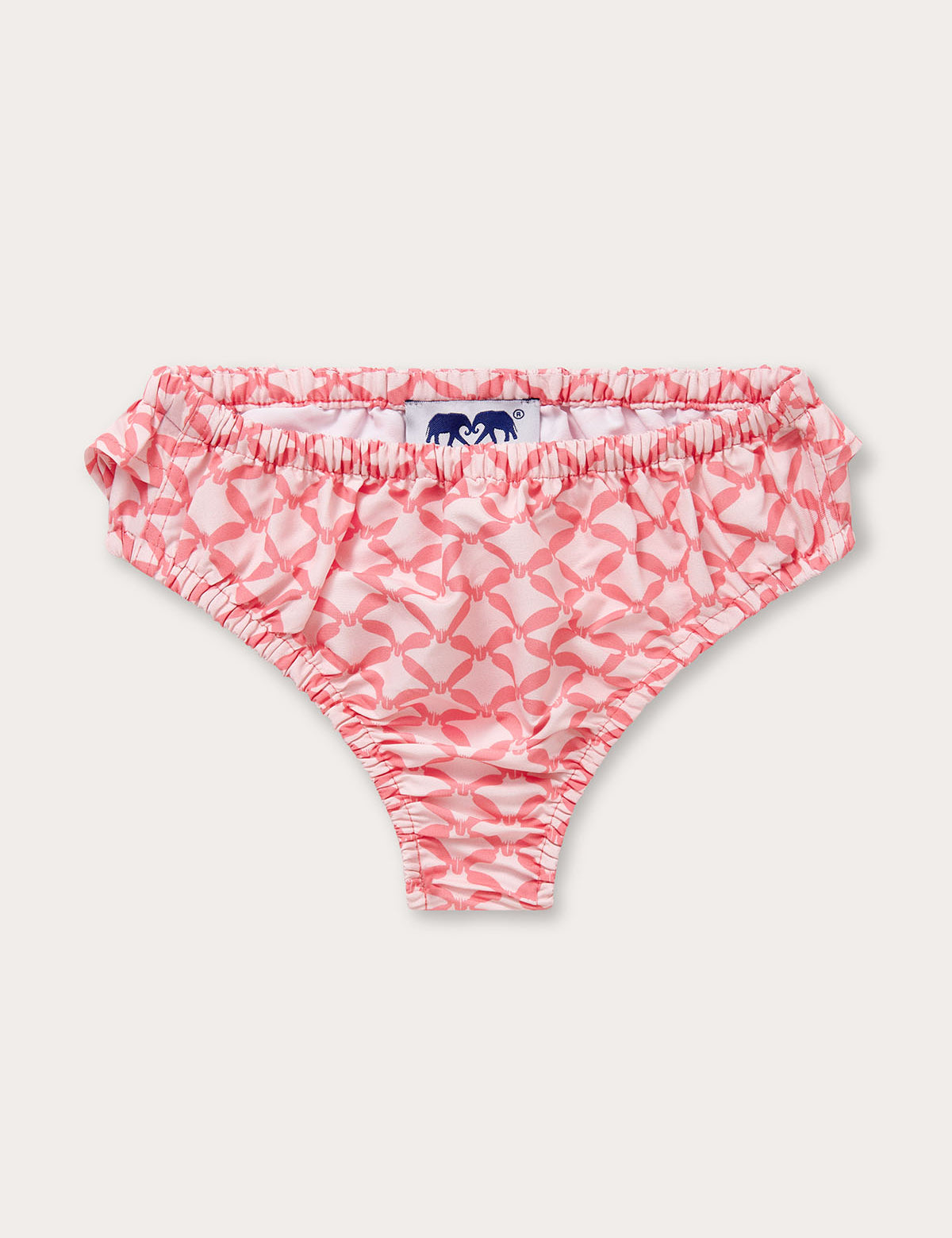 Girls Ray Rhythm Calabash baby bottoms featuring a unique diamond geometric print with grand manta rays, in light pink and watermelon hues, made from 100% recycled quick-dry fabric.