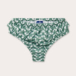 Green patterned baby bottoms featuring an elephant wave pattern resembling Indian palaces.