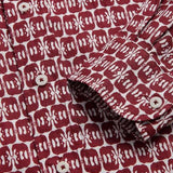 Men's Elephants of India Abaco Linen Shirt in white with dark burgundy elephant pattern, featuring buttons and long sleeves. Old money shirts made from 100% linen.