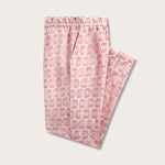 Side view of pink linen trousers showing side pocket and elastic waist, perfect for old money styling.