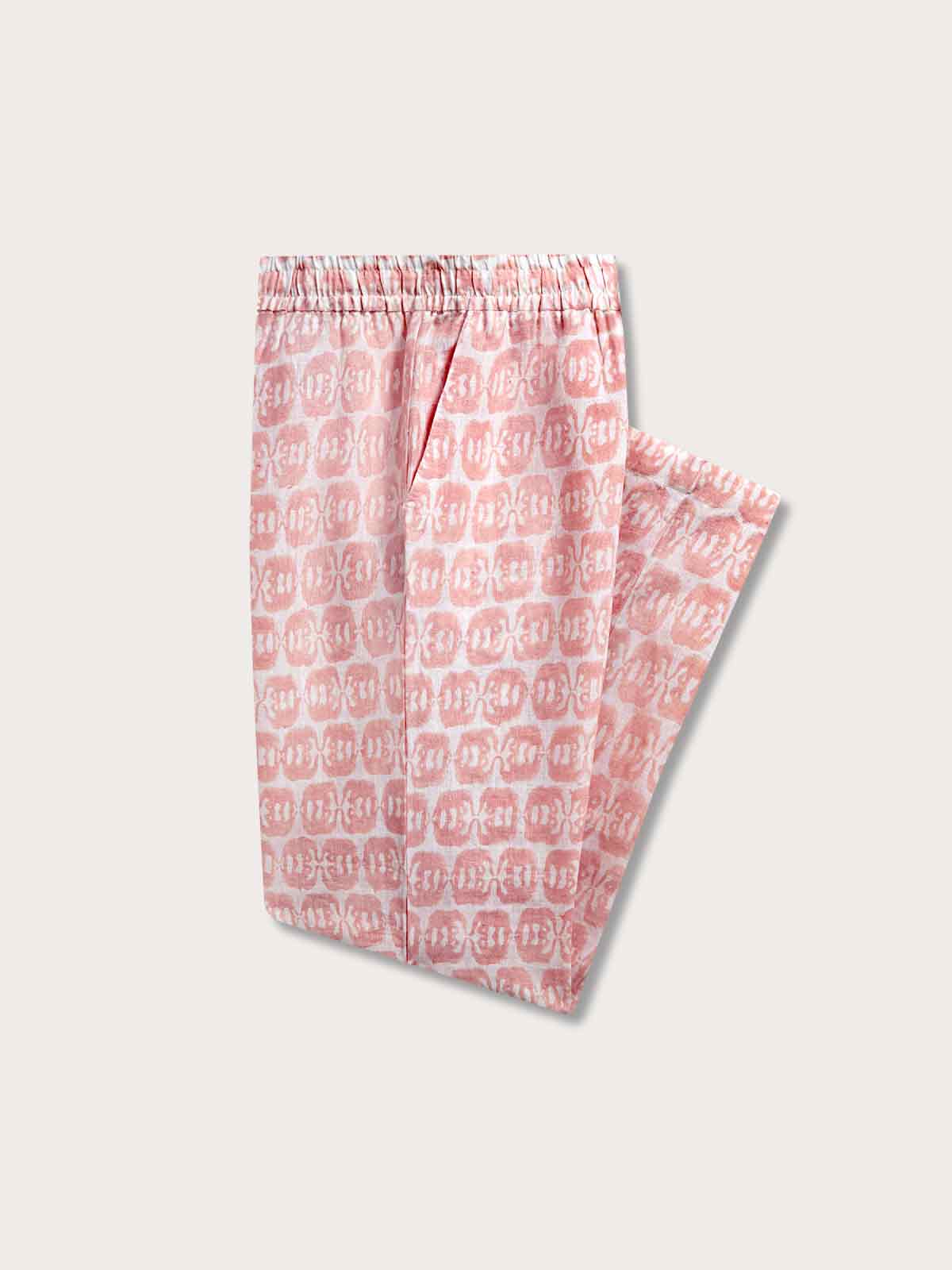 Side view of pink linen trousers showing side pocket and elastic waist, perfect for old money styling.