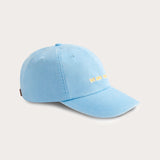 Sky blue cotton peak cap with 'We Are Family' embroidery on the front, featuring a leather strap and brass adjuster.