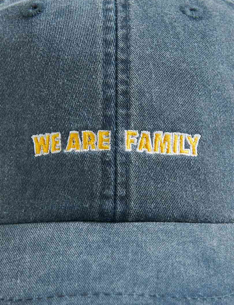 Cotton Peak Cap 'We Are Family' in Washed Navy featuring front embroidery.