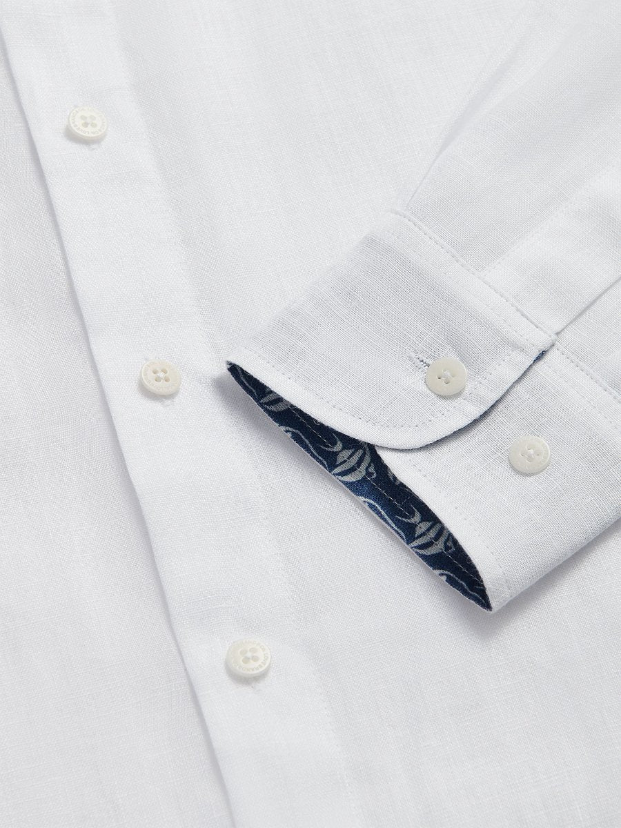 Men's White Go With The Flow Maycock Linen Shirt close-up showing button details and inner cuff design. Old money shirts made from 100% linen.