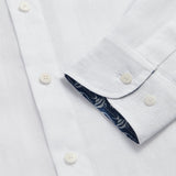 Men's White Go With The Flow Maycock Linen Shirt close-up showing button details and inner cuff design. Old money shirts made from 100% linen.