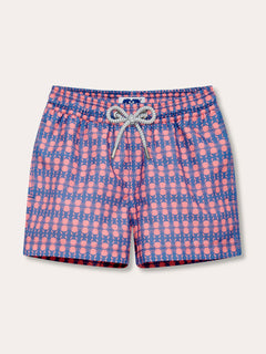 Boys Crab Pool Staniel Swim Shorts featuring a deep blue base with pink crab and watermelon pattern, elastic waistband, and a drawstring tie.