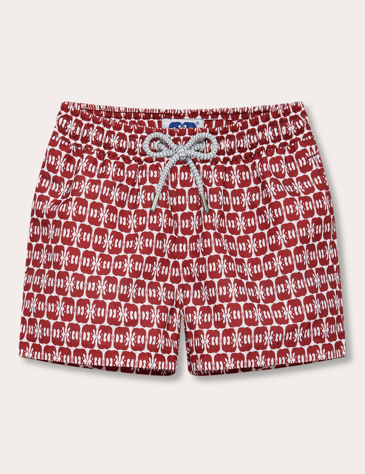 Boys Elephants of India Staniel Swim Shorts in white with deep burgundy elephant design, made from 100% recycled and quick-dry material, featuring a drawstring waist.