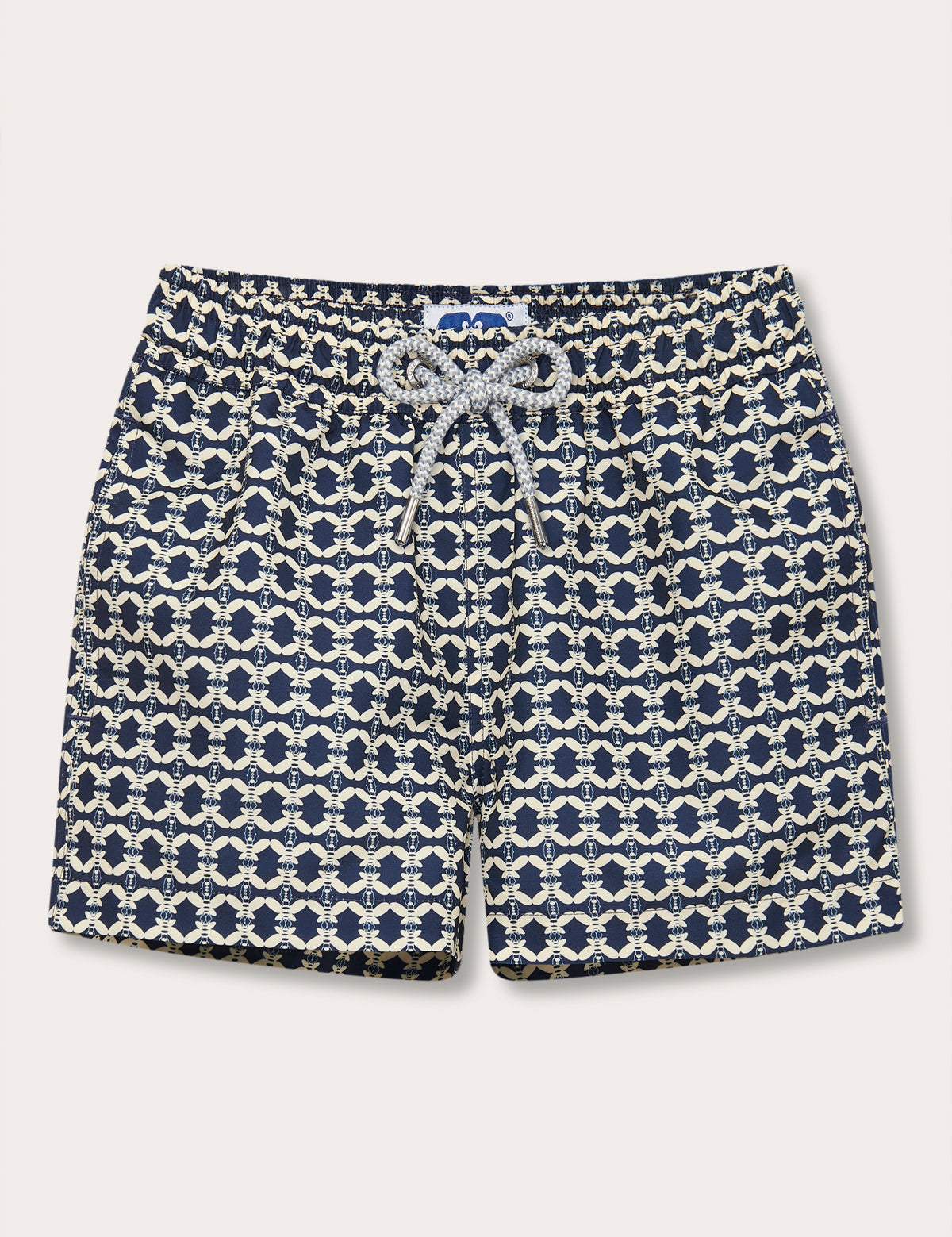 Boys Bee Propelled Staniel Swim Shorts with bee-inspired print and white drawstring on a deep blue base.