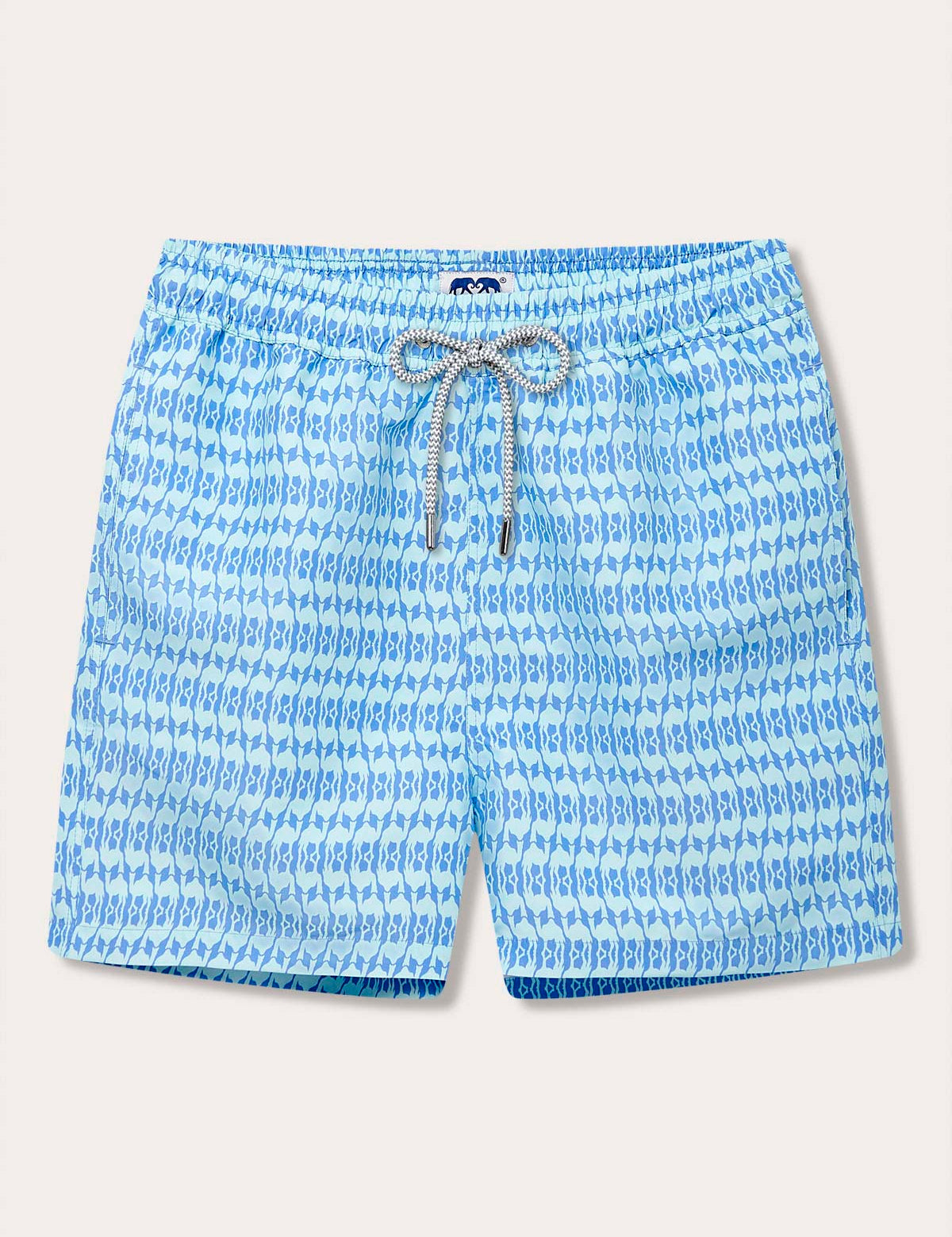 Men's Camel Mirage Sky Staniel Swim Shorts with a blue desert mirage pattern. Patterned swim shorts promoting environmental awareness through design inspired by Cop28 in Dubai 2023.