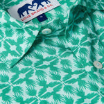 Close-up of Men's Palm Eagle Abaco Linen Shirt showcasing tropical palm leaves and eagle design with brand label. Old money shirts made from 100% linen.