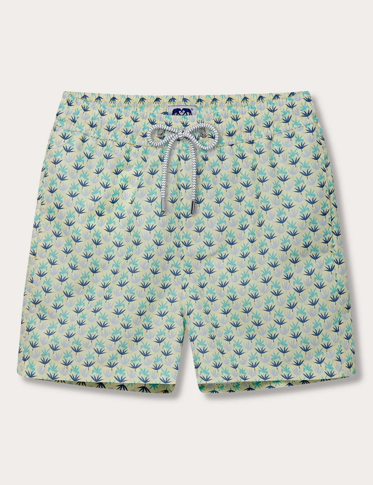 Men's Palm Sugar Staniel Swim Shorts with fan palm design, pale yellow and blue accents. Patterned swim shorts crafted from 100% recycled and quick-dry materials.