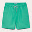 Men's Sicilian Green Staniel Swim Shorts made from 100% recycled, quick-drying material. Plain swim shorts featuring an adjustable waistband and vibrant green color inspired by Sicily's natural beauty.