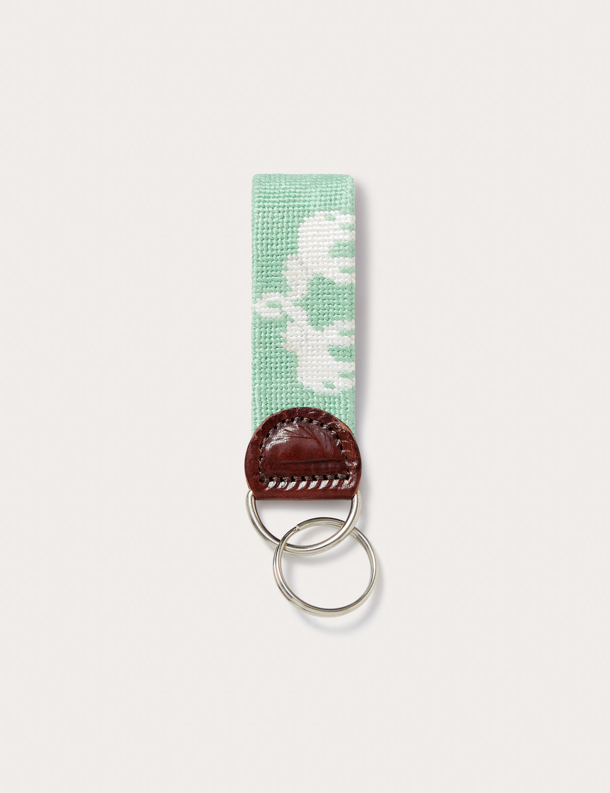 Love Brand green key chain featuring elephant palace needlepoint design. Green keyring made from genuine leather.