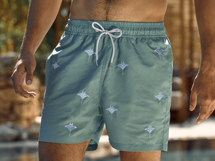 Close up of men’s sustainable swimwear