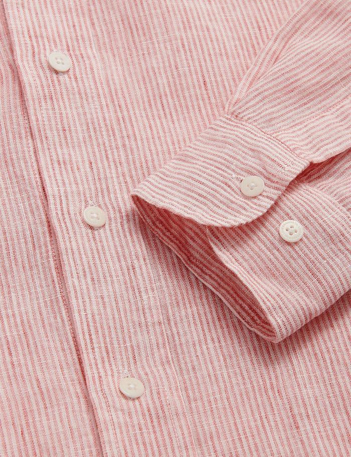 Close-up view of the Men's Red Lines Abaco Linen Shirt showing thin red stripes and white buttons.