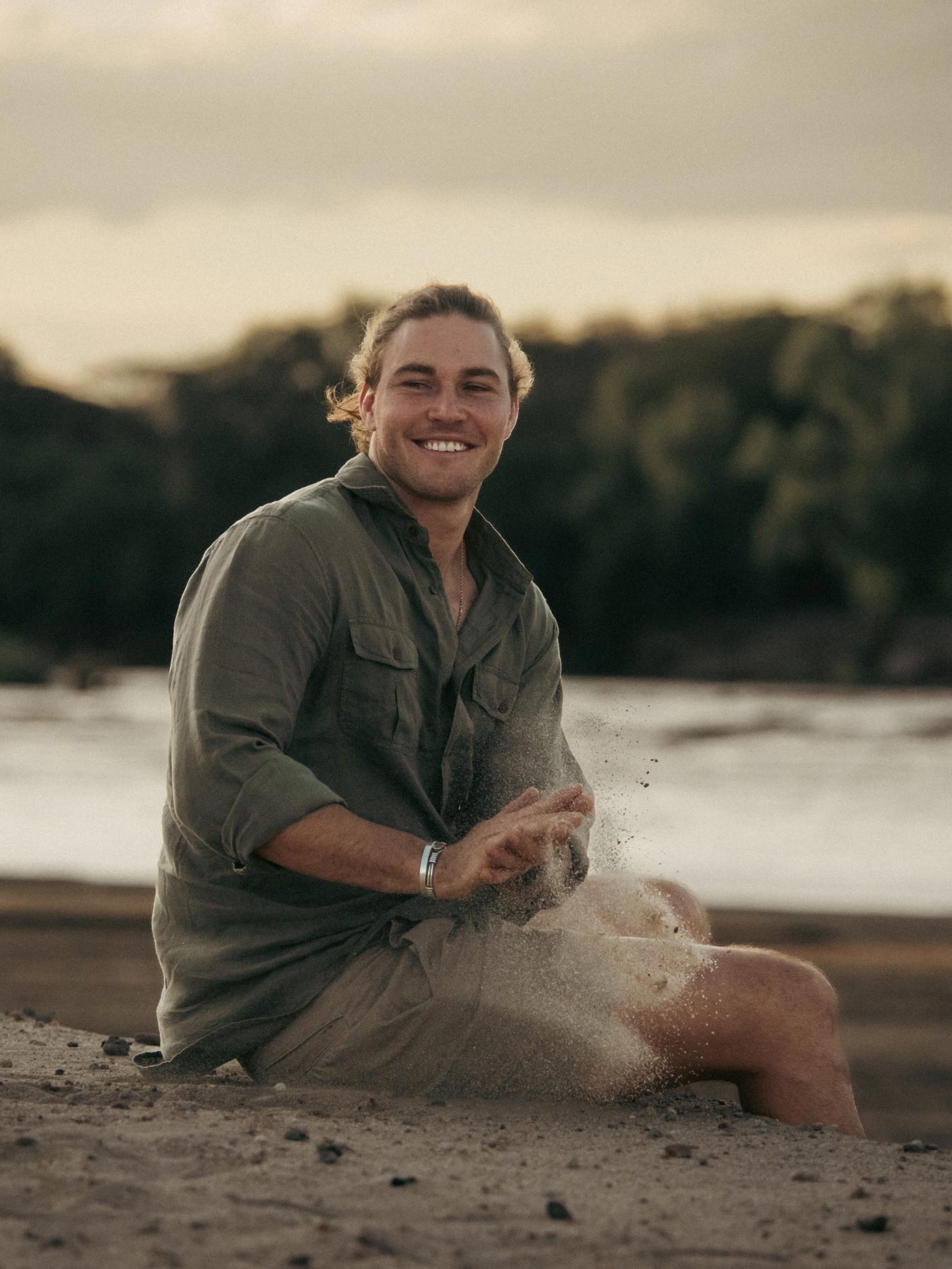 Roan Carr-Hartley of Sheldrick Wildlife Trust wearing Love Brand on a beach in Kenya