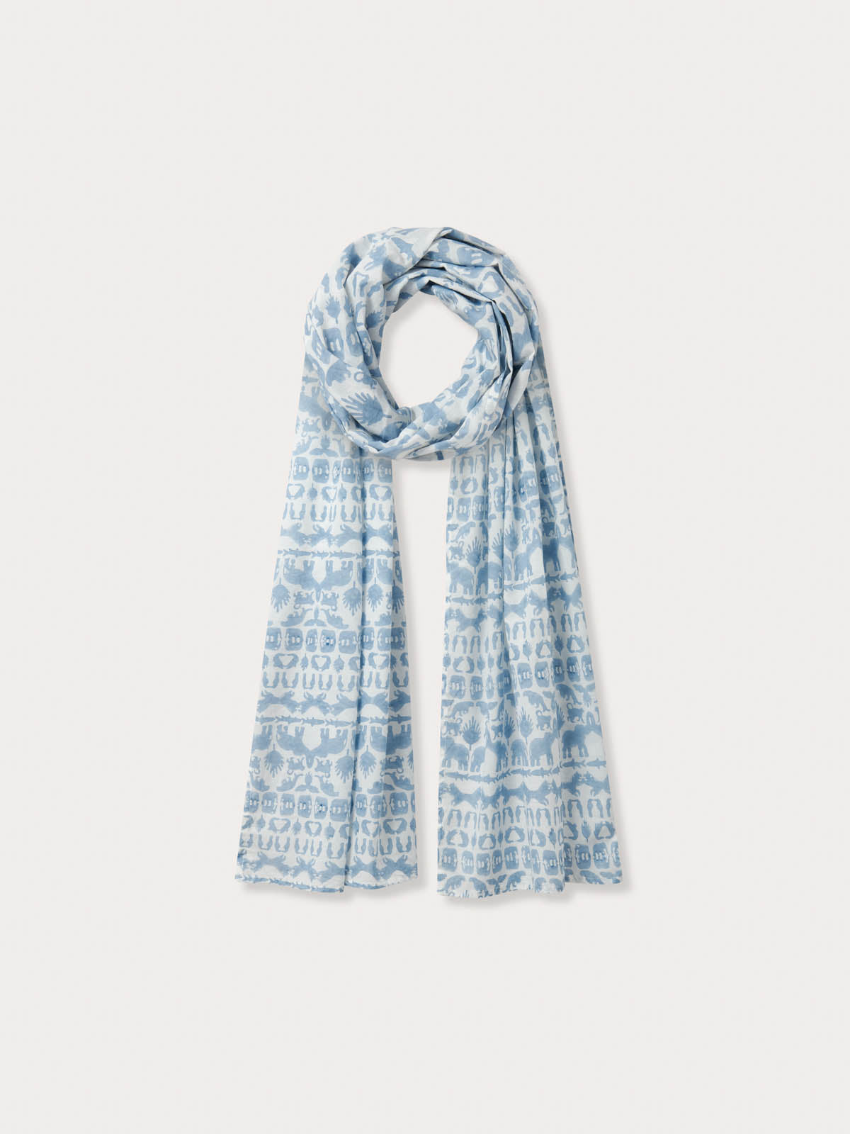 Yuma Linen Scarf - Coexist in sky blue featuring block-printed elephants, tigers, and hornbills on premium Belgian linen.