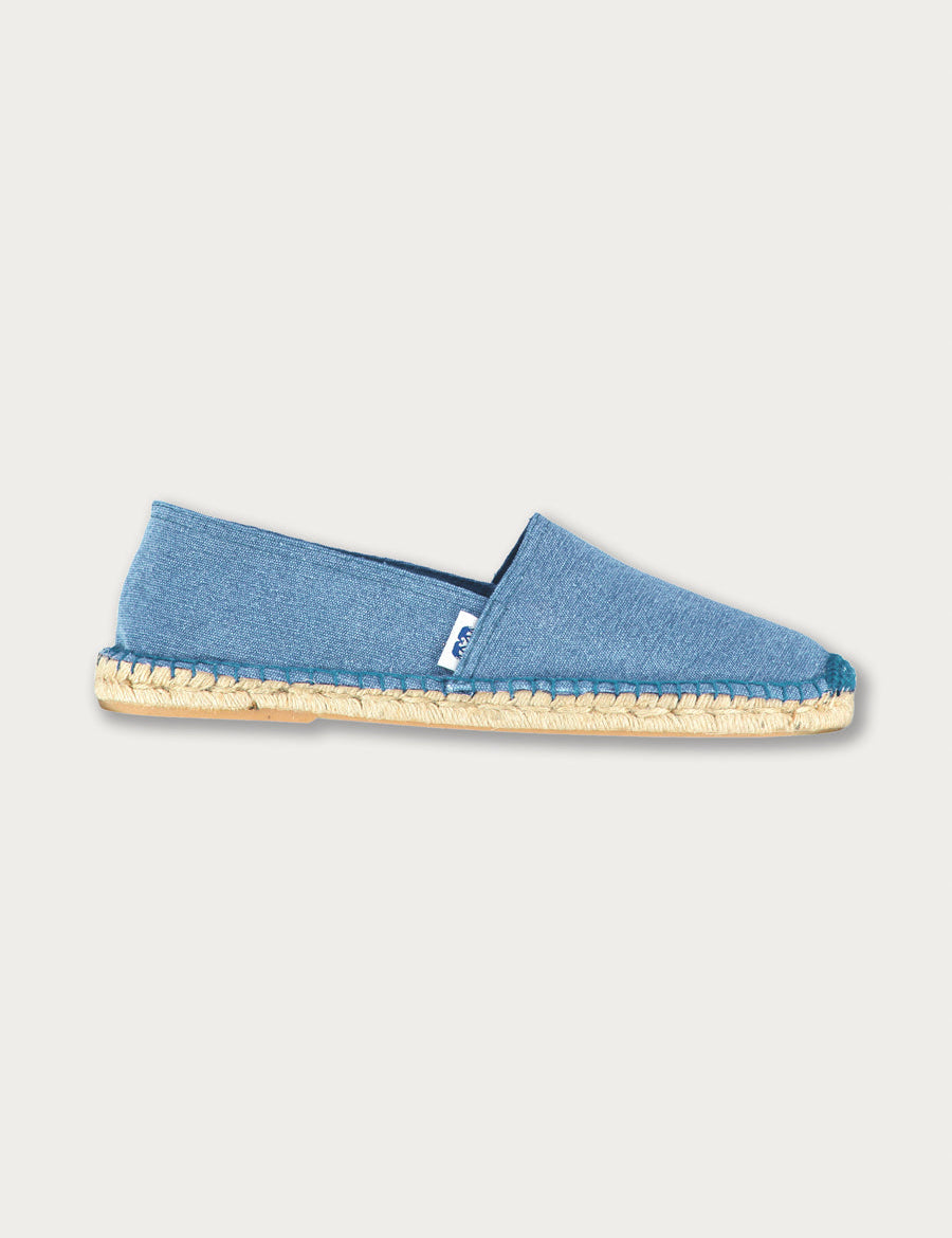 Side view of love brand blue espadrilles